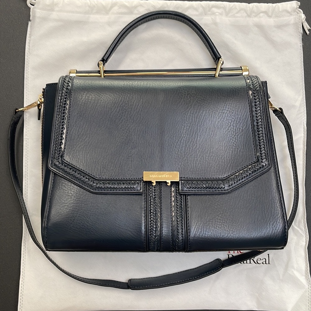 BCBGMaxazria navy blue leather handbag.
